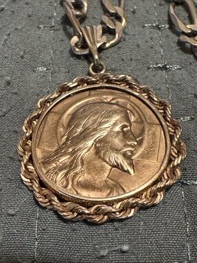 35 gram 14kt custom made charm and 22” 5.5-6 mm figaro necklace